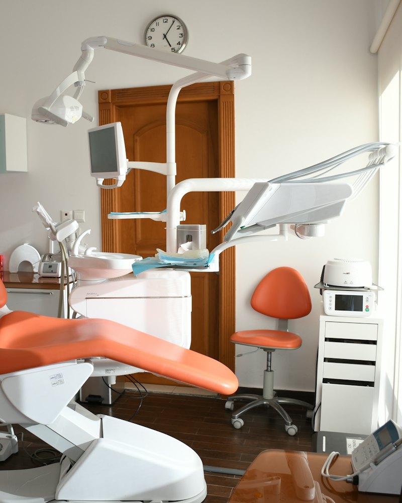 Dental treatment chair and equipment in a bright surgery